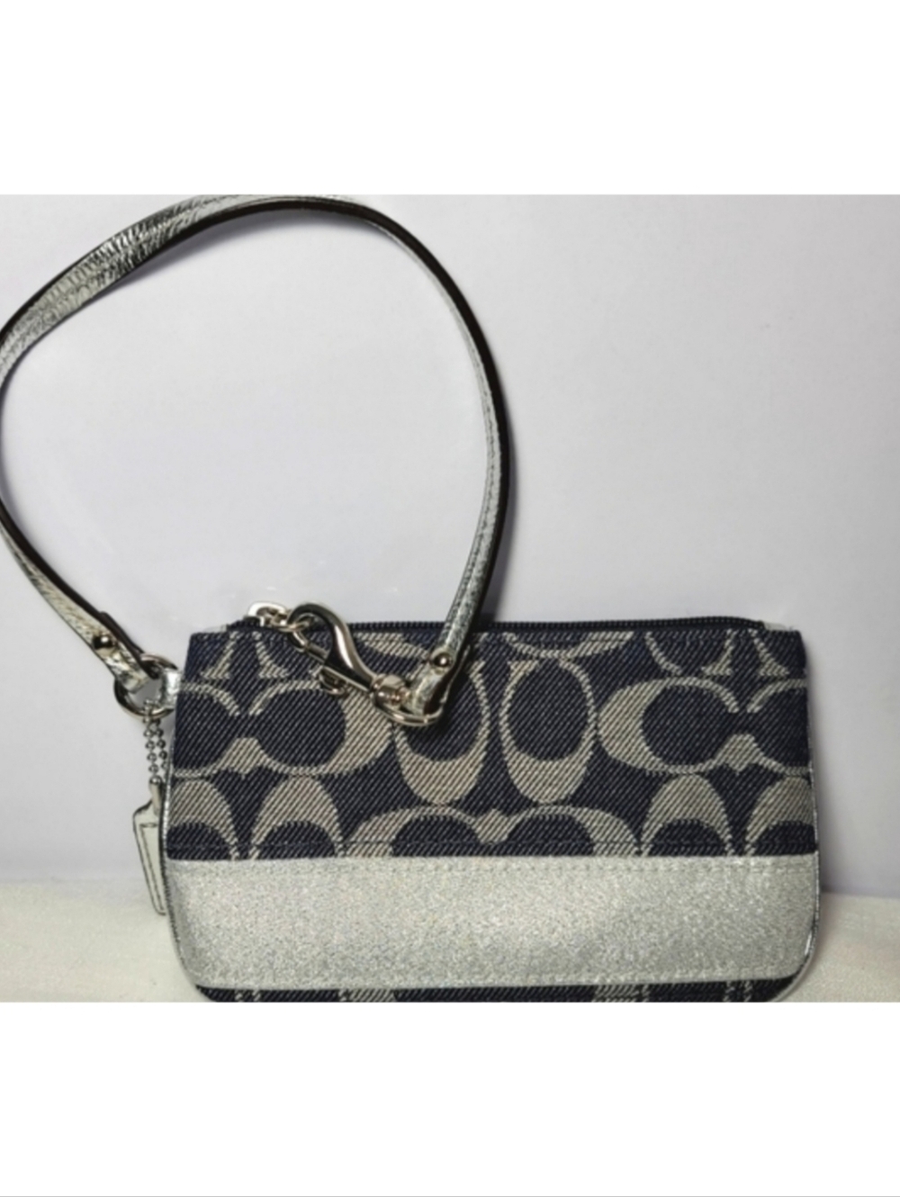 Coach Black, Gray, and Gold Wristlet.